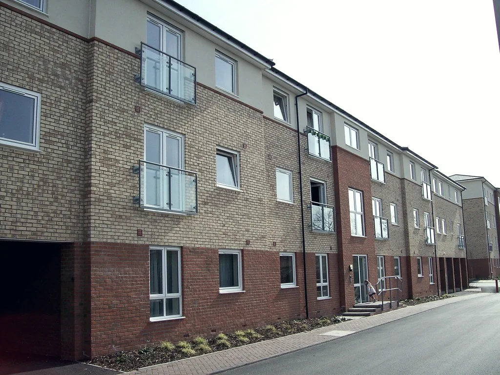 A terrace of newly built social housing flats